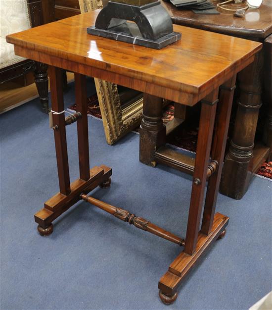 A George IV rosewood rectangular occasional table on end standards, W.61cm